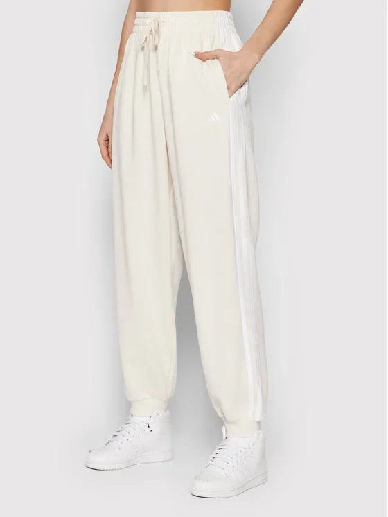 Adidas Pantaloni da tuta Essentials Studio Lounge 3-Stripes